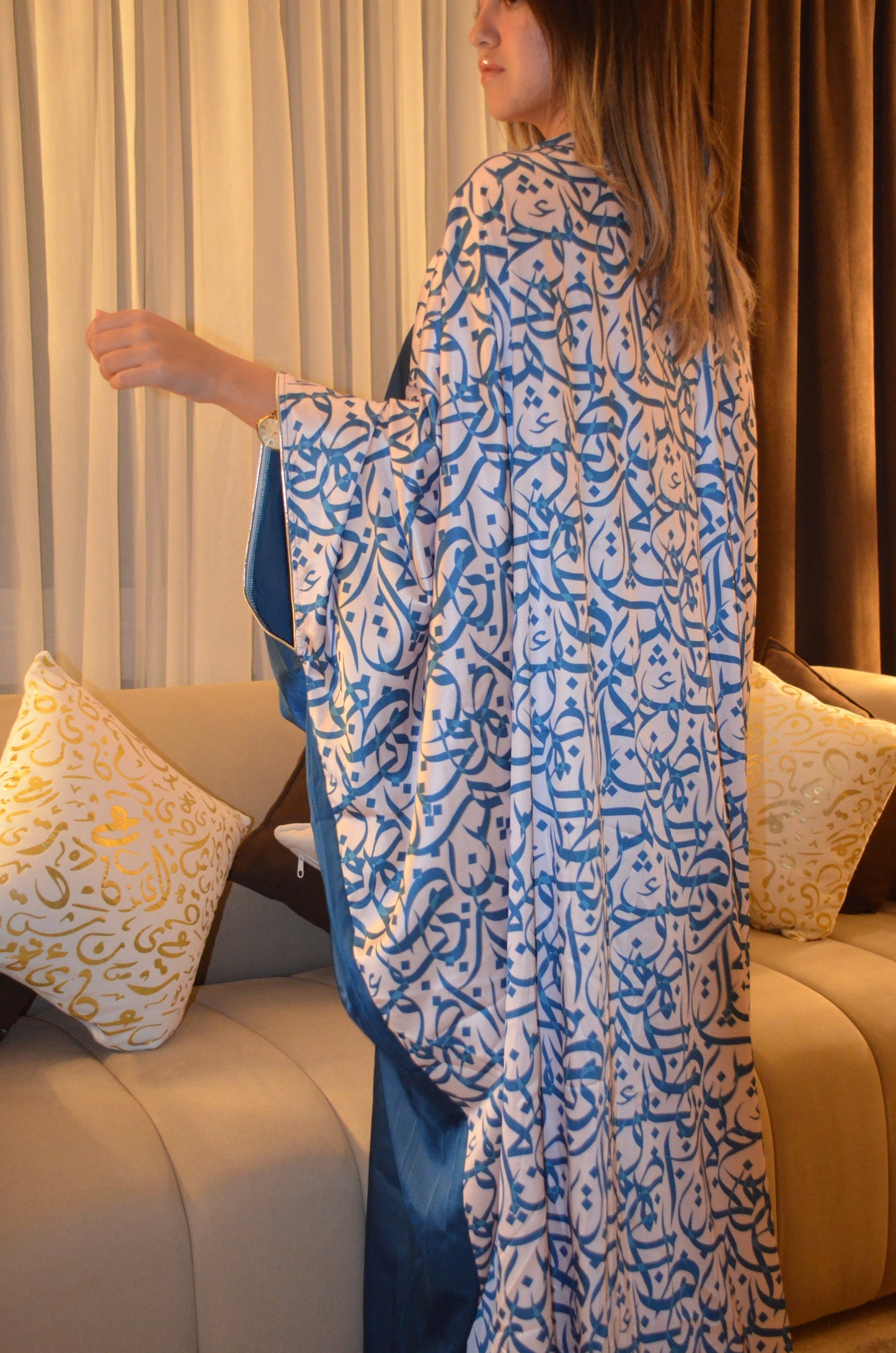 White calligraphy Yale Blue Abaya